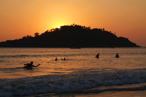 In-the-sea-at-sunset-palolem