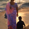Woman-in-pink-and-blue-sari-with-child-varkala