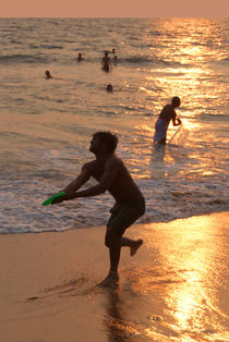 Frisbee Thrower on Varkala Beach at Sunset by serenityphotography