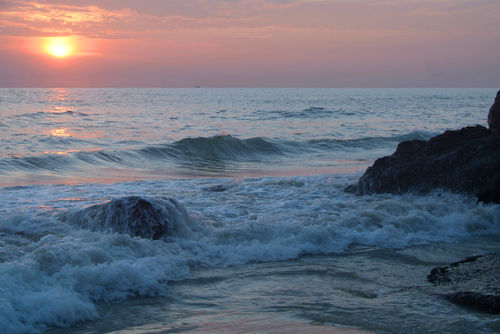 Water-on-the-rocks-at-sunset-varkala