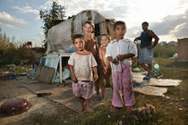 Gypsykids in front of their house-to-be-built by Peter van Beek