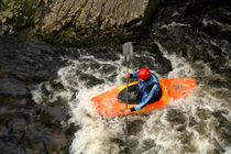 Orange Kayak Paddling by serenityphotography