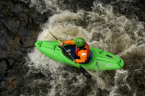 Green Kayak Paddling by serenityphotography