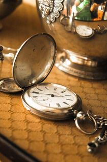 old watch in an antique shop by yulia-dubovikova