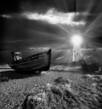 abandoned fishing boat and lighthouse by meirion matthias