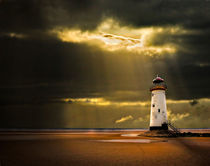 talacre lighthouse with sunbeams by meirion matthias