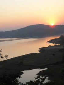 Sunset at lake by Nandan Nagwekar