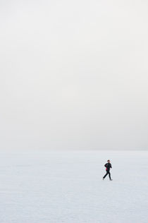 Running in white stillness by Lars Hallstrom